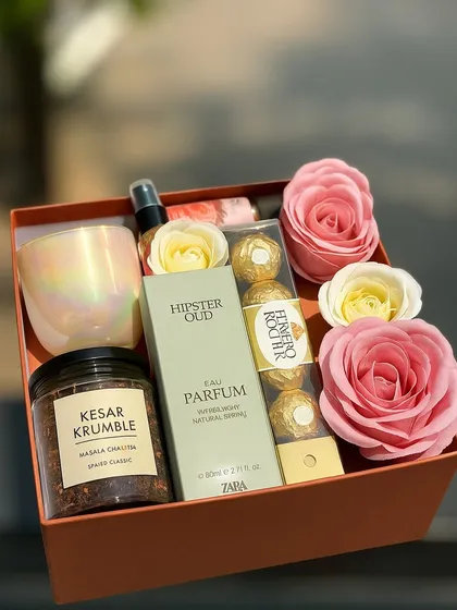 A box full of love for the queen of our hearts. This Mother's Day hamper features Kesar Krumble from Arq Mithai, a Zara perfume, Ferrero Rocher, and Forest Essentials rosewater.