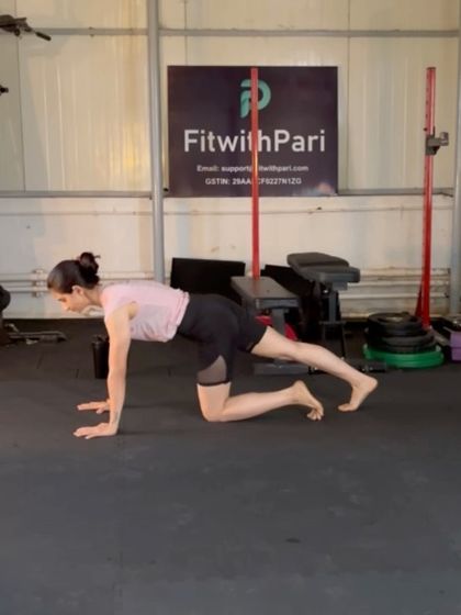 A quadruped leg extension. This move targets the glutes and hamstrings while requiring core stability to keep the hips level.
