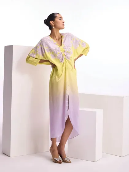 A beautiful ombre dress in shades of yellow and lavender, a unique and artistic piece for a stylish brunch or day event.