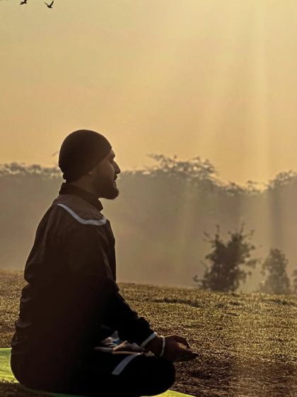 A moment of quiet meditation in the early morning light. Connecting with my breath and the stillness of nature is an essential part of my personal practice.