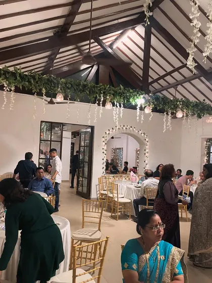 The beautiful indoor dining area at Pioneer Hall, Bandra, where we catered a Saturday night get-together. Our service integrates seamlessly with any venue's decor.