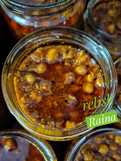 My Chana Kairi Pickle is a unique combination of chickpeas and raw mango. The kabuli chana is soaked in raw mango water until it becomes soft and sour, then it's mixed with grated kairi and spices in mustard oil.