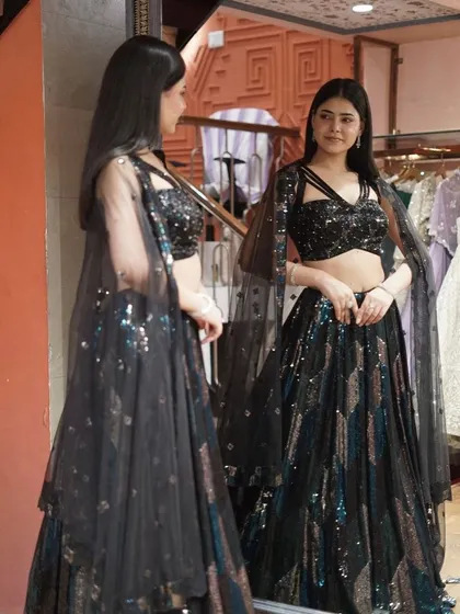 Draped in dreams, this limited edition black sequin lehenga weaves a story of grace and glamour.