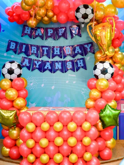 Goal. We bring your child's dream theme to life with detailed decorations. This football themed birthday setup includes a custom backdrop, balloon arch, and a trophy for the birthday star.
