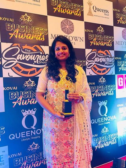 Standing proudly with my award. This recognition motivates me to keep innovating and providing the best platter decoration services for weddings and other ceremonies.