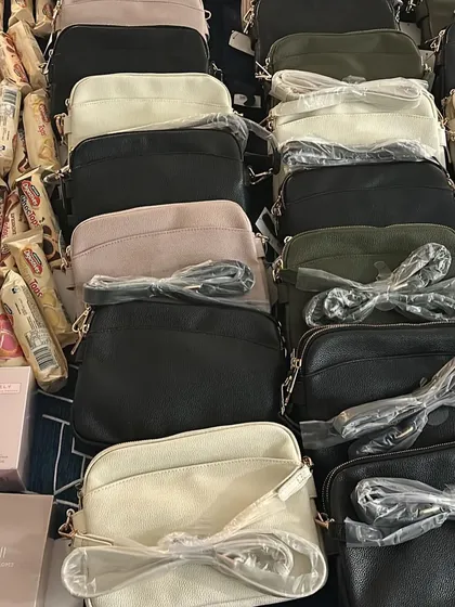 A big haul from one of my shopping trips. Lots of crossbody bags and some popular Australian snacks that customers requested. Thank you for your trust.