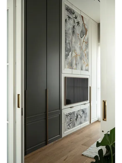 The den room is a perfect example of multi-functional design. The sofa easily converts to a bed, while the custom storage and bar unit ensure the space is always ready for guests or a quiet evening in.