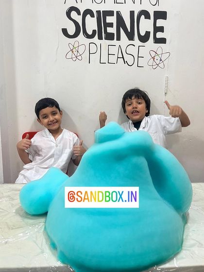 Look at that foam! This is a glimpse from our potion mixing chemistry class, where kids create a safe but impressive "elephant's toothpaste" reaction. They give it two thumbs up!