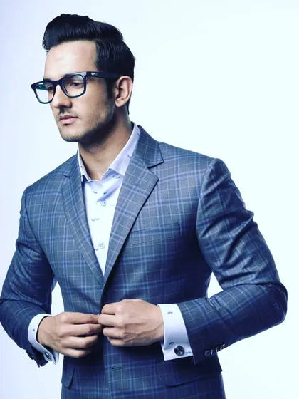 This made to measure plaid suit shows how we can incorporate modern patterns. The jacket is cut to provide a clean silhouette, paired with a custom fitted shirt for complete comfort and style.