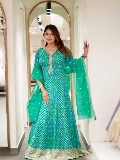 The full look of this stunning green Anarkali, perfect for any festive event.