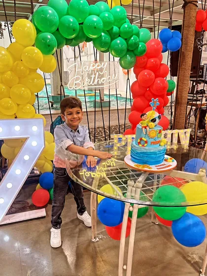 A fun pool party-themed cake for Prishiv's 7th birthday. The bright colors and playful elements like a beach ball and sunglasses make it perfect for a summer celebration.
