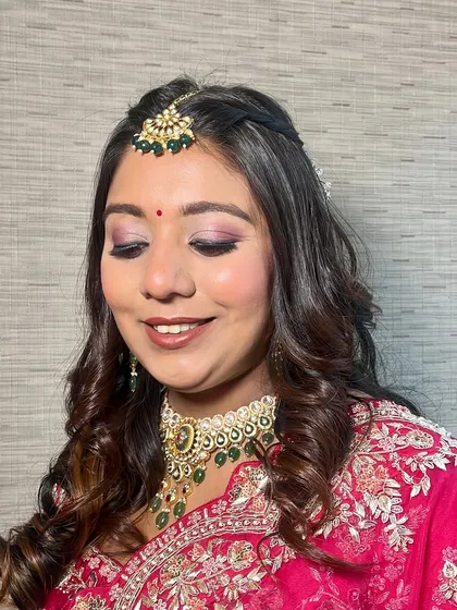 A close-up of this dewy, natural makeup look. I used soft pink and brown tones on the eyes and cheeks to create a warm, romantic glow perfect for her wedding event.