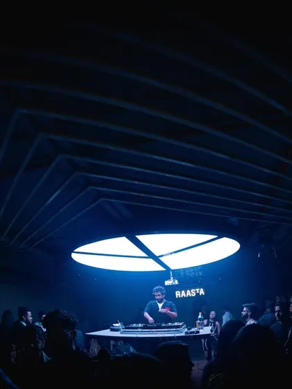 A moodier shot from my Nagpur gig, with deep blue lights creating a cool, focused atmosphere before the energy peaks.