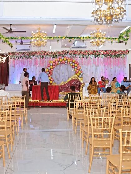 The seating arrangement facing the stage at our Badlapur banquet hall, ready for a birthday or naming ceremony.