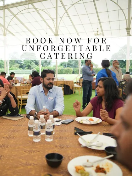 Guests engaged in conversation while enjoying a meal at one of our events. We believe that great food and a comfortable atmosphere are key to creating memorable social gatherings.
