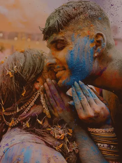 Love should be joyful and a little bit messy. This moment from a Haldi ceremony is pure, uninhibited happiness. I live for capturing these candid, vibrant moments where you forget the camera is even there and just exist in the color and laughter of it all.