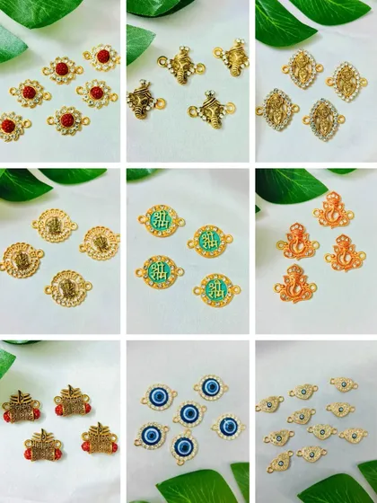 Explore our collection of religious and traditional Rakhi charms. This image shows Ganesha, Om, and Swastik designs that are perfect for creating sacred threads for the festival.