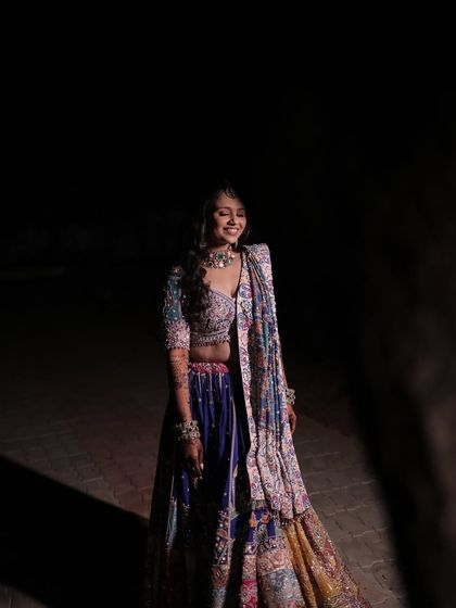 A full view of a stunning Dandiya night outfit, complemented by my signature glam. The makeup enhances her features without feeling heavy, ensuring she feels comfortable and beautiful while dancing.