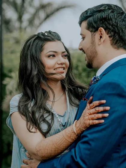 An intimate engagement portrait where the bride's loving gaze says it all. We focus on capturing the quiet, romantic moments that show the deep bond and the beginning of a forever journey.