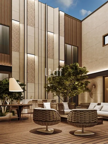 This residential courtyard is designed to blend indoor and outdoor spaces for healthy living. Strategically placed seating areas foster a sense of togetherness amidst nature, while warm lighting and greenery create the perfect aura for enjoying the outdoors.