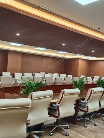 This is a view of the large-scale conference room we delivered for NBCC, a Government of India enterprise. The project highlights our ability to furnish expansive, high-stakes environments with custom conference tables and uniform executive seating.