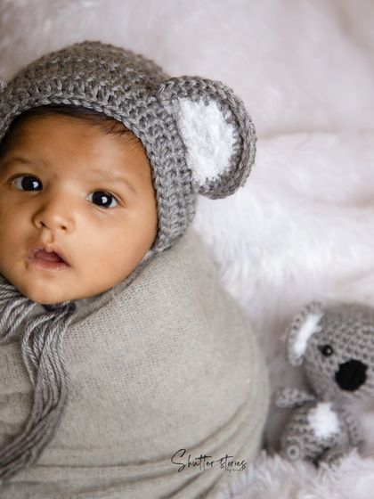 Another shot of our little koala, looking alert and oh-so-cute with his matching koala toy.