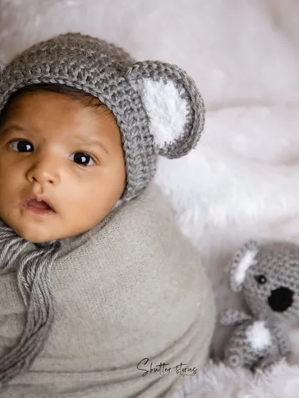 Another shot of our little koala, looking alert and oh-so-cute with his matching koala toy.