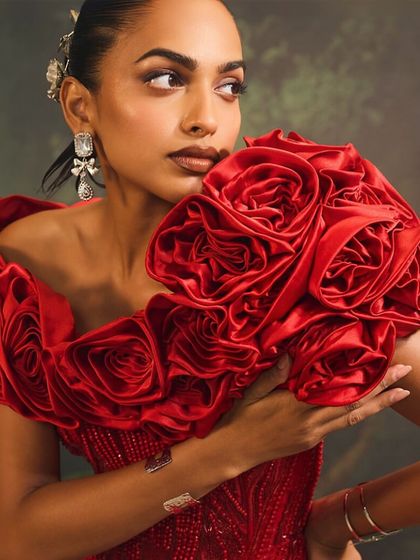 Celebrating feminine allure, this close-up of the Bellerose Gown's 3D cape highlights the breathtaking detail that defines my couture collection.