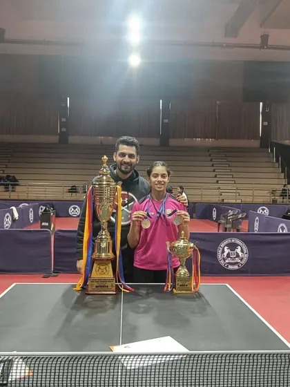 Here I am with Ananya Chande and her trophies at the SGFI national games. Being there to witness our players' success firsthand is one of the greatest honors as a coach.