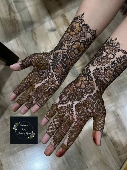 A beautiful floral design with a mix of bold flowers and delicate vines, creating a balanced and elegant look.