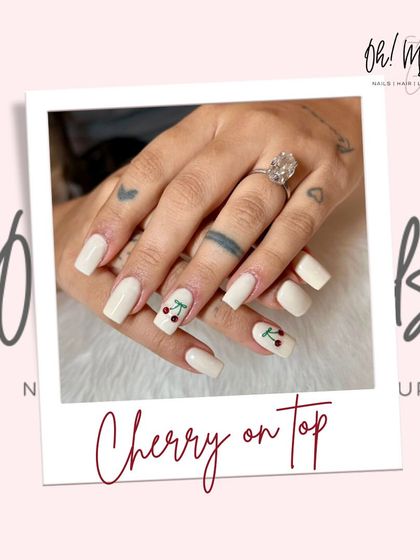 Fresh, fun, and fruity. This cute design features a solid off-white base with two accent nails showcasing adorable, hand-painted cherries.