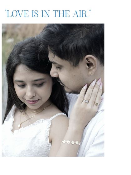 A collage design featuring a close-up romantic shot with the text 'Love is in the air'.