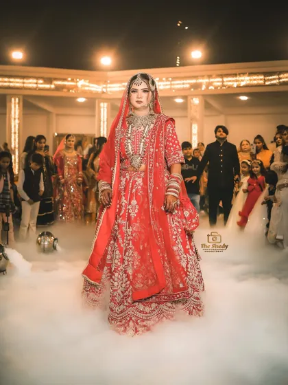 A bride's entry is a showstopper moment. I captured this shot using low-angle perspective and dry ice to create a dramatic, dream-like effect as she walks towards her new beginning.