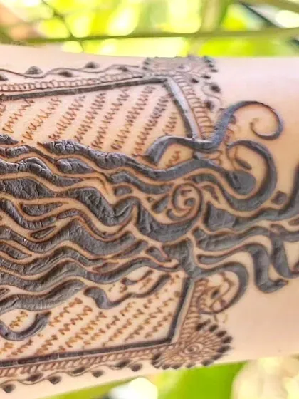 A detail shot of the flowing hair, showing how the lines extend beyond the frame to create a sense of movement and freedom.