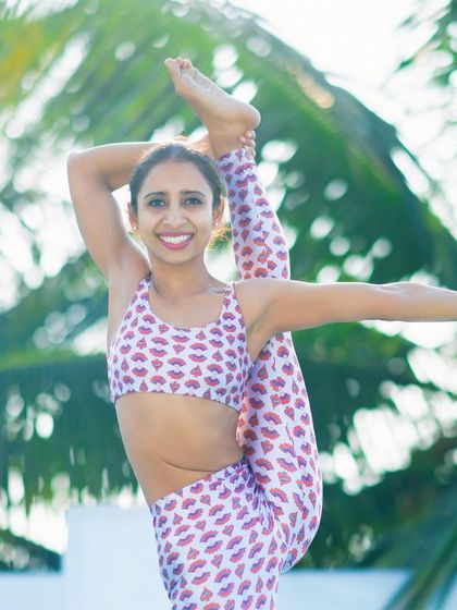 The joy of practice shines through. Chandana's ability to hold advanced postures with a smile is an inspiration to explore our own potential with dedication and a light heart.