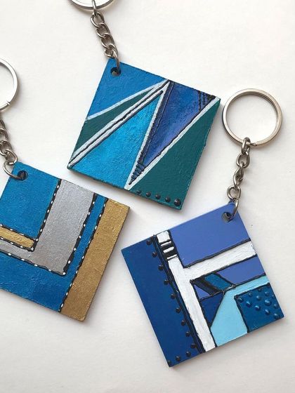 More variations of the geometric abstract keychains. I play with lines, blocks of colour, and metallic accents to create these mini paintings you can carry with you.