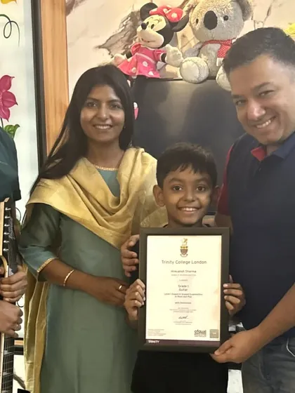 A proud moment for this young guitarist, his family, and our club. Presenting a Trinity College certificate is a formal recognition of the hard work and dedication he has put into his online music lessons.