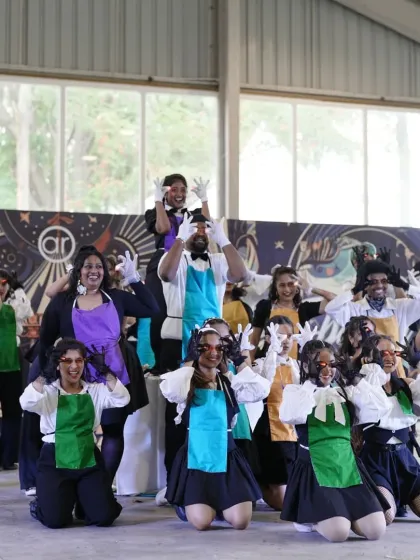 The Open Style batch in another creative and theatrical pose during their performance.