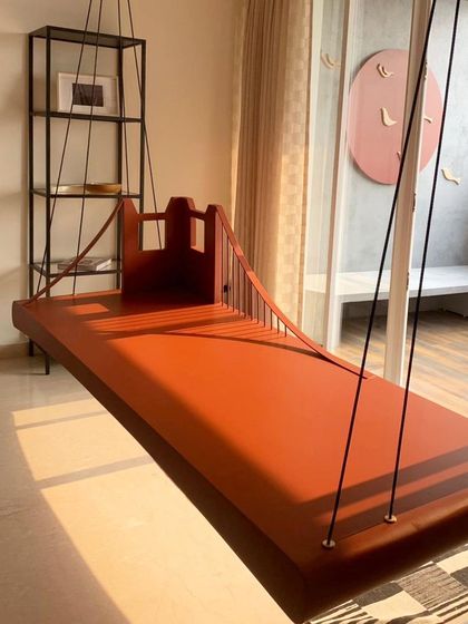 A duplicate image of the Golden Gate Bridge swing in the sunlight.