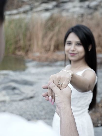 A duplicate of a 'follow me' style shot, capturing the invitation and romance of the moment.