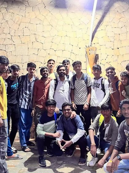 A large group of our students posing together, capturing the fun and camaraderie of the 2023 Sai Classes picnic.