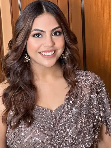 A bright, happy smile from a happy client. This soft glam makeup was all about creating a fresh, polished look that would last through a night of dancing at the sangeet.