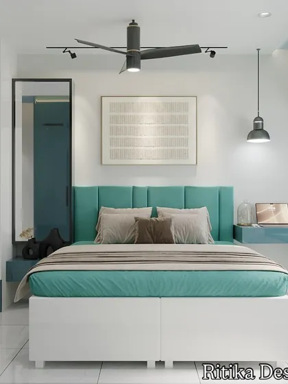 This bedroom demonstrates how a compact space can be both stylish and highly functional. I integrated a sleek work desk and a cozy window seat into the layout, using a refreshing teal and white color scheme to create a bright, modern, and multi-purpose personal haven.