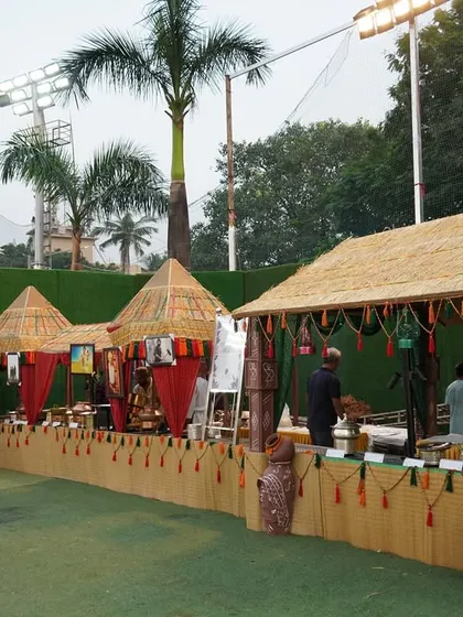 I can transform any space with themed catering. Here, I created an entire village-themed food festival for an outdoor event, complete with rustic stalls and traditional decor to offer a truly immersive culinary journey.