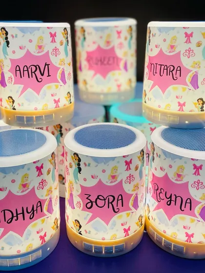 Royally enchanting return favours for a princess themed birthday. These personalised speakers feature a variety of Disney princesses.