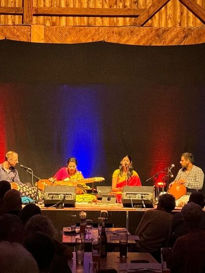 A view from the audience at our concert in Sontheim, Germany. The stage lighting and the rustic wooden hall created a magical atmosphere for the performance.