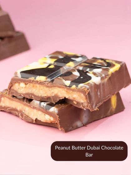 For peanut butter lovers, this Peanut Butter Dubai Chocolate Bar is a dream come true. It features a creamy peanut butter filling inside a rich chocolate shell.