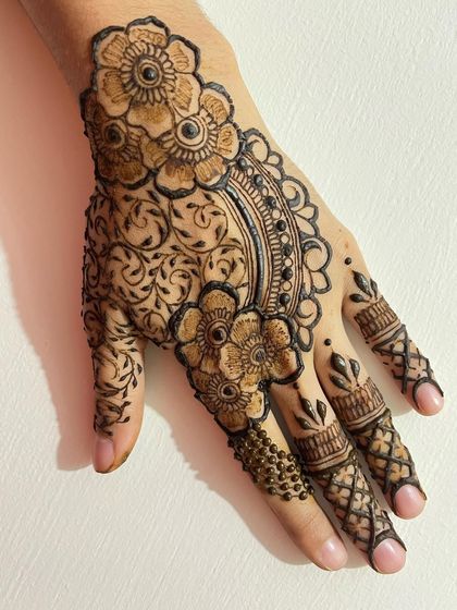 Another angle of the semi bridal design, showcasing the intricate vine work filling the background.