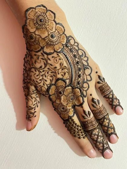 Another angle of the semi bridal design, showcasing the intricate vine work filling the background.
