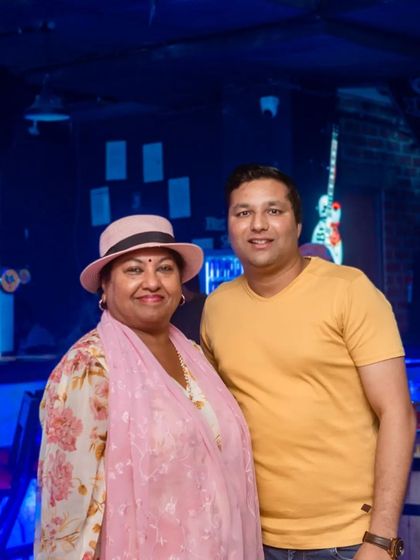 A couple dressed up for a fun night out.